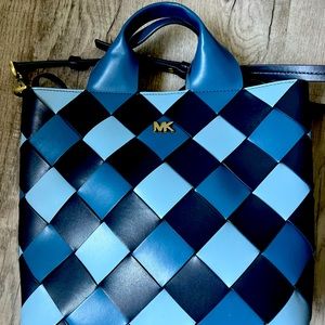Michael Kors handbag in 3 shades of blue.  13” across, 10.5” tall, 3.5” wide.